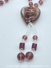 MaxSold Auction: Vintage Murano mauve glass heart lariat tassel necklace. - Richmond Hill (Ontario, Canada) SELLER MANAGED Downsizing Online Auction - Townwood Drive