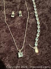 MaxSold Auction: Jewelry - Sterling, Light Blue Topaz   - Webster (New York, USA) PARTNER MANAGED Estate Sale Online Auction - Everwild View