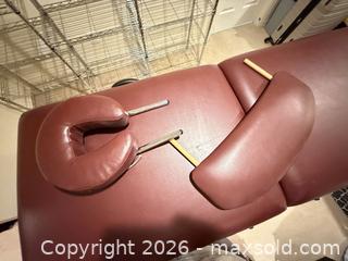 MaxSold Auction: Portable Burgundy Vinyl Massage Table with Wood Frame - Longmont (Colorado, USA) SELLER MANAGED Downsizing Online Auction - Trail Ridge Road