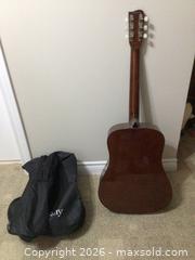 MaxSold Auction: Acoustic Guitar - Windsor (Ontario, Canada) SELLER MANAGED Downsizing Online Auction - Kingston