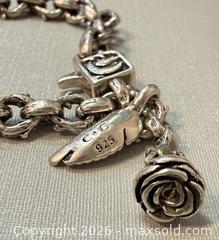 MaxSold Auction: Signed Clocks and Colors 925 Silver Bracelet - Marked  - Toronto (Ontario, Canada) PARTNER MANAGED Reseller Online Auction - Queen Street West.