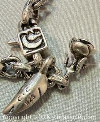 MaxSold Auction: Signed Clocks and Colors 925 Silver Bracelet - Marked  - Toronto (Ontario, Canada) PARTNER MANAGED Reseller Online Auction - Queen Street West.