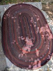 MaxSold Auction:  LARGE VINTAGE OVAL BRAIDED RUG  - Loyalist (Ontario, Canada) SELLER MANAGED Downsizing Online Auction - Main Street Bath