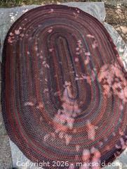 MaxSold Auction:  LARGE VINTAGE OVAL BRAIDED RUG  - Loyalist (Ontario, Canada) SELLER MANAGED Downsizing Online Auction - Main Street Bath