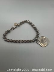 MaxSold Auction: Authentic Tiffany & Co. Sterling silver bead heart tag bracelet  - Richmond Hill (Ontario, Canada) SELLER MANAGED Downsizing Online Auction - Townwood Dr.