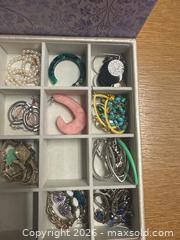 MaxSold Auction: Mixed Metal Sterling & Gold-Plated Jewelry Lot (25–50 pcs) - Didsbury (Alberta, Canada) PARTNER MANAGED Moving Online Auction - Deer Coulee Drive