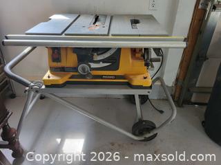 MaxSold Auction: Ridgid 10 inch Table Saw with Stand, Blade & Rip Fence - Kitchener (Ontario, Canada) SELLER MANAGED Downsizing Online Auction - Schweitzer