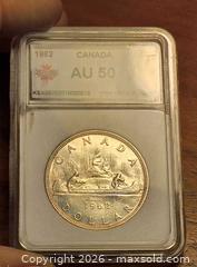 MaxSold Auction: 1962 Canada Silver $1 Coin, KSA Slabbed - South Frontenac (Ontario, Canada) SELLER MANAGED Downsizing Online Auction - Battersea Road