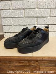 MaxSold Auction: Christian Louboutin Black Low-Top Leather & Suede Sneakers  - Toronto (Ontario, Canada) SELLER MANAGED Downsizing Online Auction -  Lonsdale Road (CONDO)