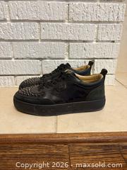 MaxSold Auction: Christian Louboutin Black Low-Top Leather & Suede Sneakers  - Toronto (Ontario, Canada) SELLER MANAGED Downsizing Online Auction -  Lonsdale Road (CONDO)