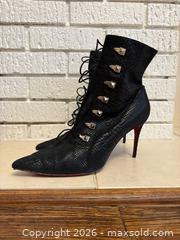 MaxSold Auction: Christian Louboutin Snake-Embossed Leather Ankle Boots, EU 41 - Toronto (Ontario, Canada) SELLER MANAGED Downsizing Online Auction -  Lonsdale Road (CONDO)