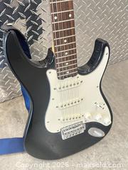 MaxSold Auction: Peavey Electric Guitar Black  - Vancouver (British Columbia, Canada) PARTNER MANAGED Estate Sale Online Auction -  East 7th Avenue (STORAGE)
