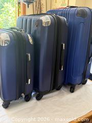 MaxSold Auction: 3 hardcase suitcases - Saanich (British Columbia, Canada) SELLER MANAGED Downsizing Online Auction - Inez Drive