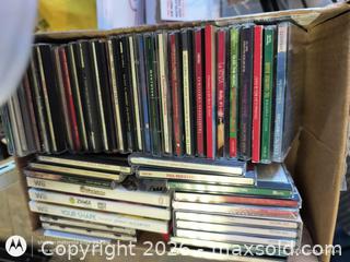 MaxSold Auction: Lot of 26-50 Audio CDs and Wii Game Discs (Cases Included) - Kingston (Ontario, Canada) SELLER MANAGED Downsizing Online Auction -  Railway Street