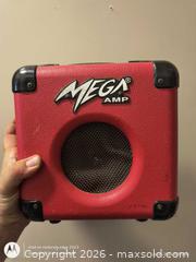 MaxSold Auction: Mega Amp VL-10 Practice/Portable Mini Guitar Amp - Red - Kingston (Ontario, Canada) SELLER MANAGED Downsizing Online Auction -  Railway Street