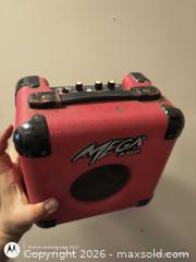 MaxSold Auction: Mega Amp VL-10 Practice/Portable Mini Guitar Amp - Red - Kingston (Ontario, Canada) SELLER MANAGED Downsizing Online Auction -  Railway Street