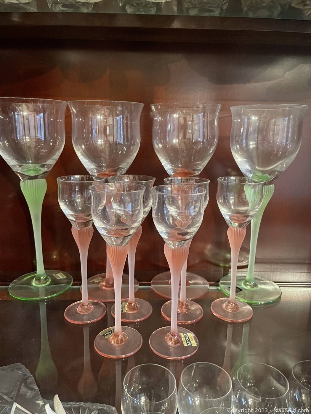 Sold at Auction: (4) Mikasa Crystal Sea Mist Tulip Wine Glasses