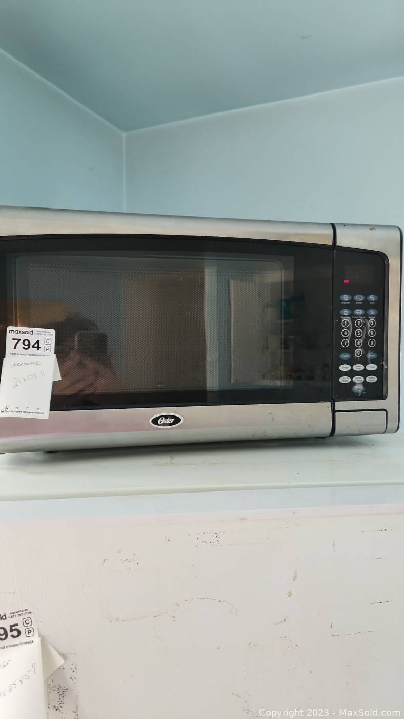 https://d12srav5gxm0re.cloudfront.net/auctionimages/82748/1684785848/woster_microwave_a-794-1.jpg