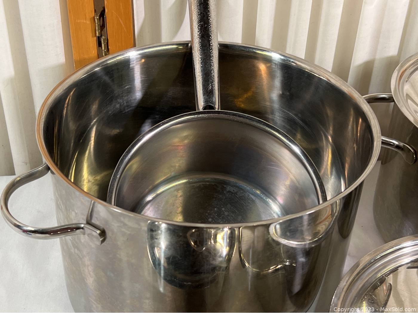 Sold at Auction: (8pc) Magnalite Steel Cookware