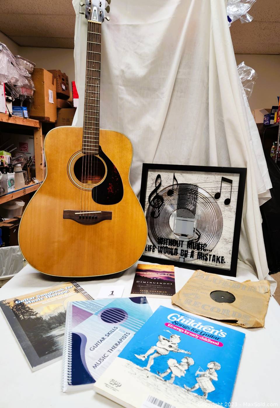 Yamaha FG-180 Guitar & Books | MaxSold