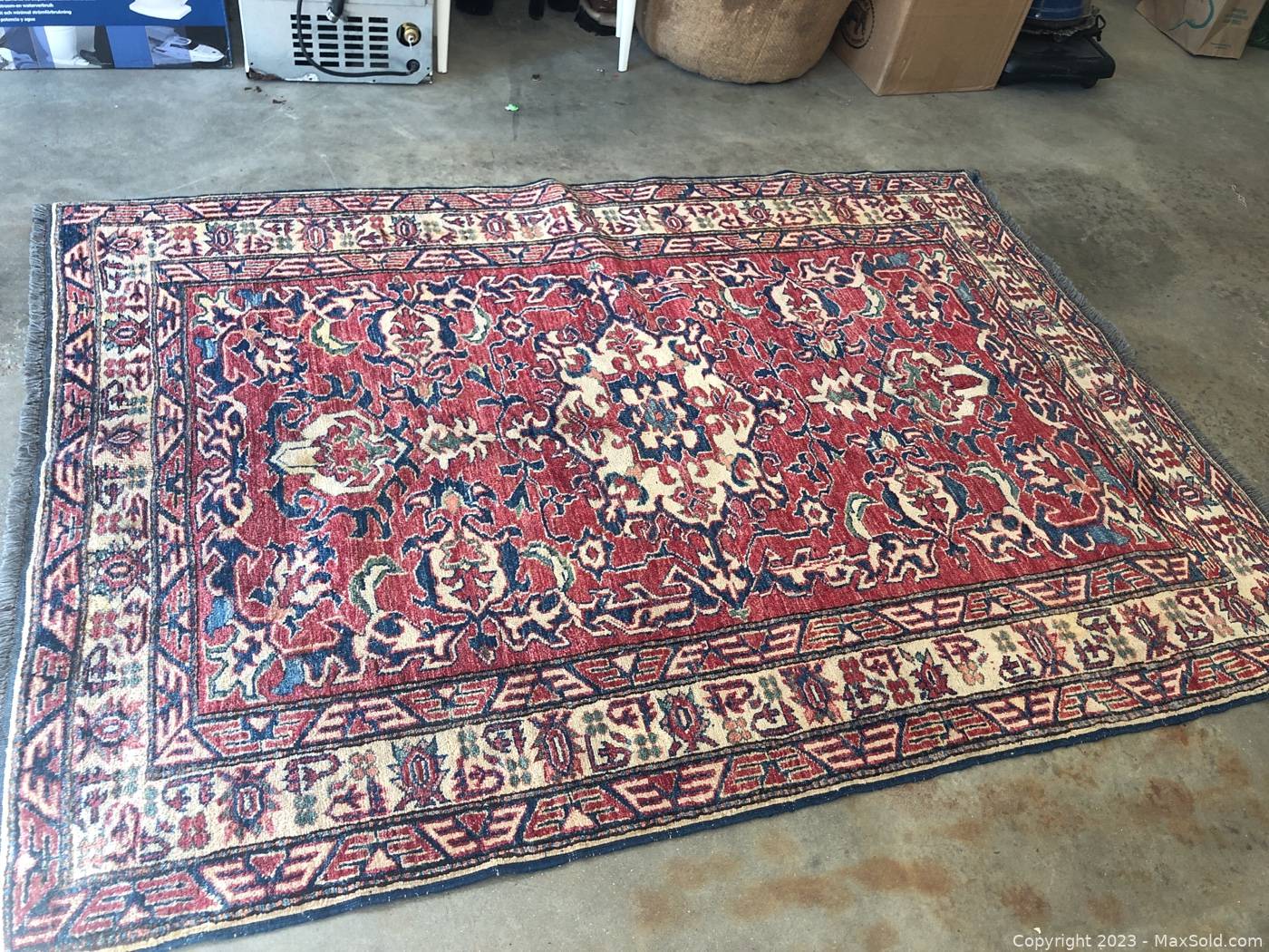 Sold at Auction: GARAGE RUG