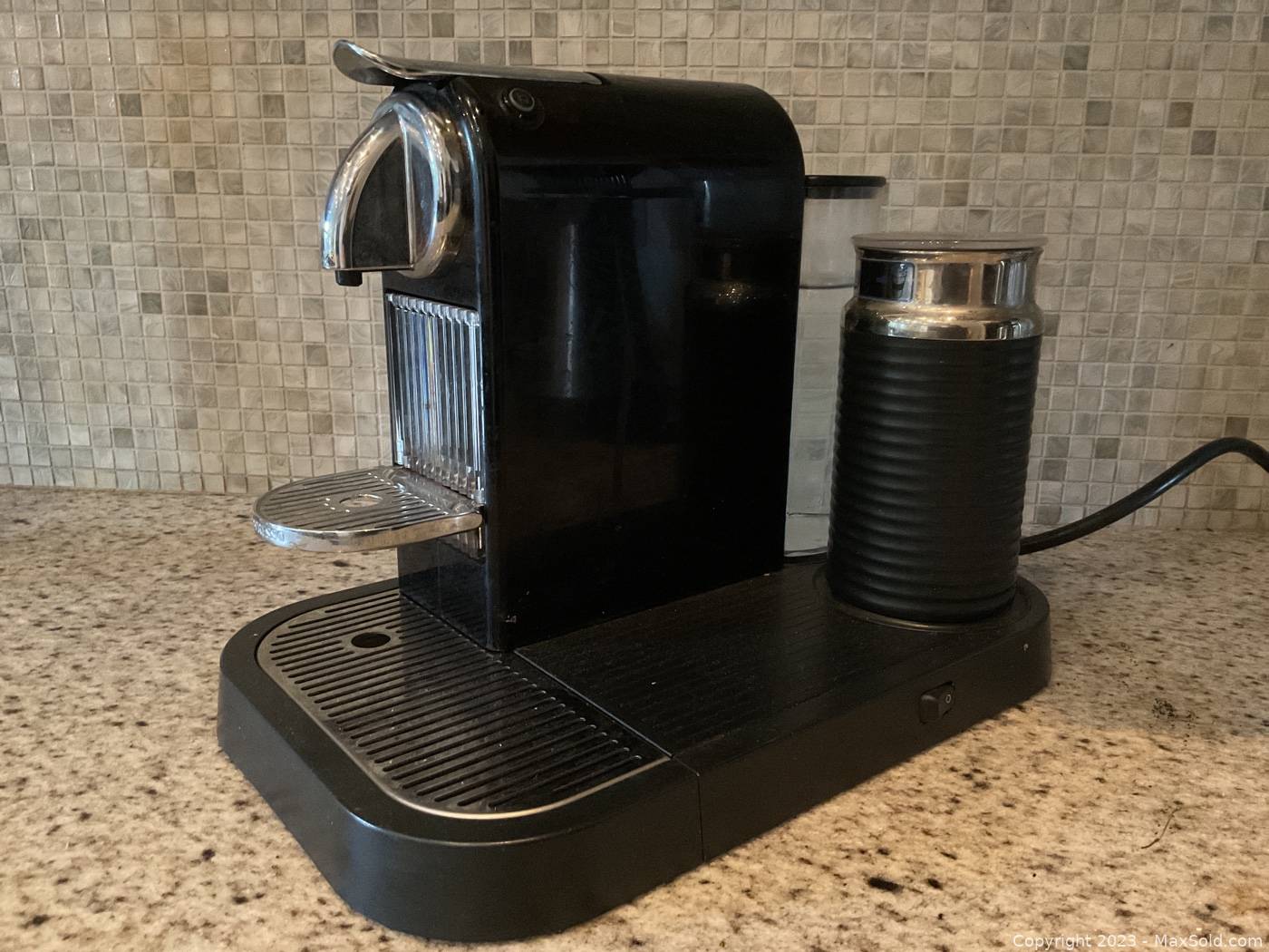 https://d12srav5gxm0re.cloudfront.net/auctionimages/86775/1697752048/wnespresso_espresso_machine-567-1.jpeg