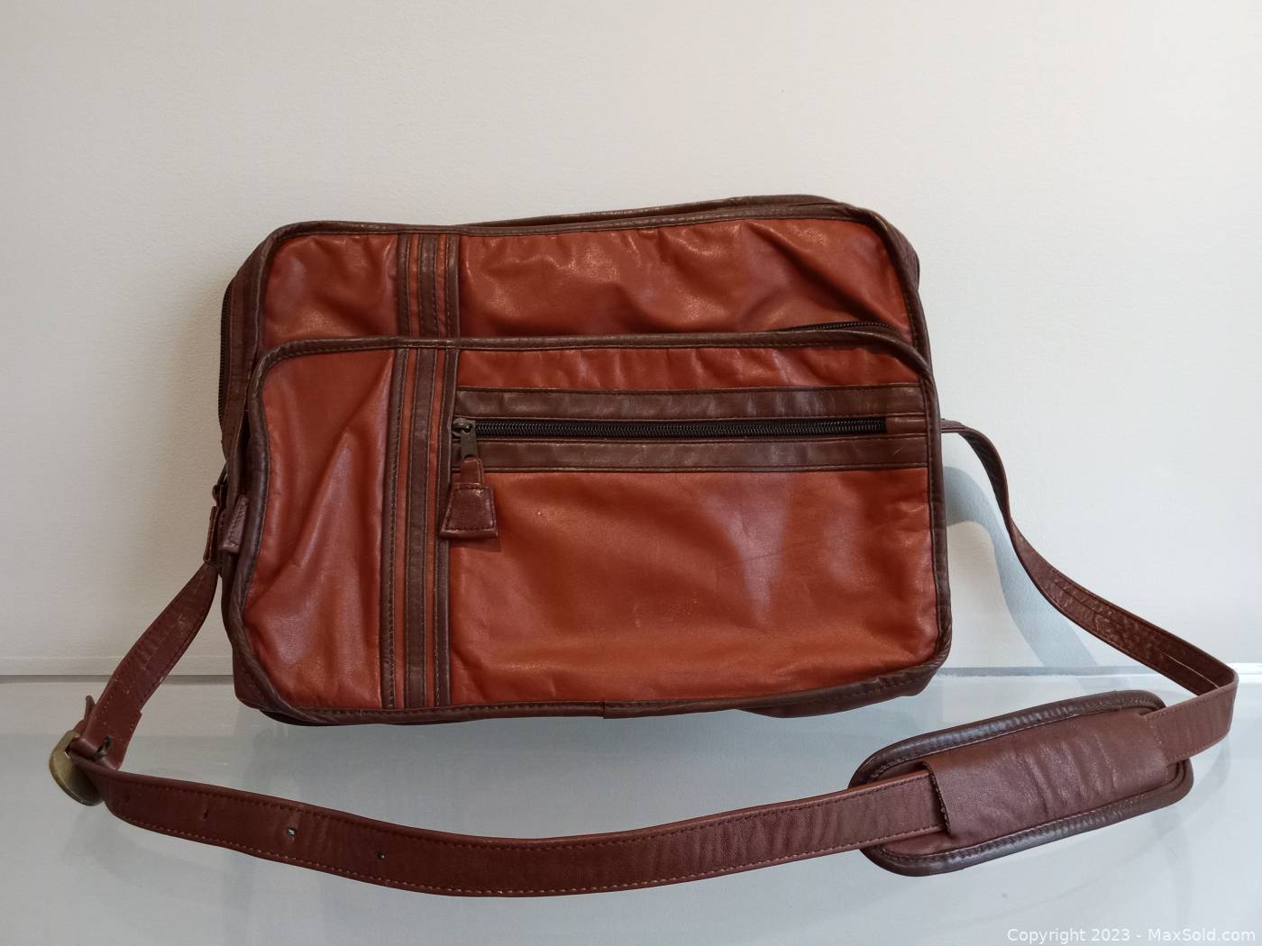 Land discount leather bags