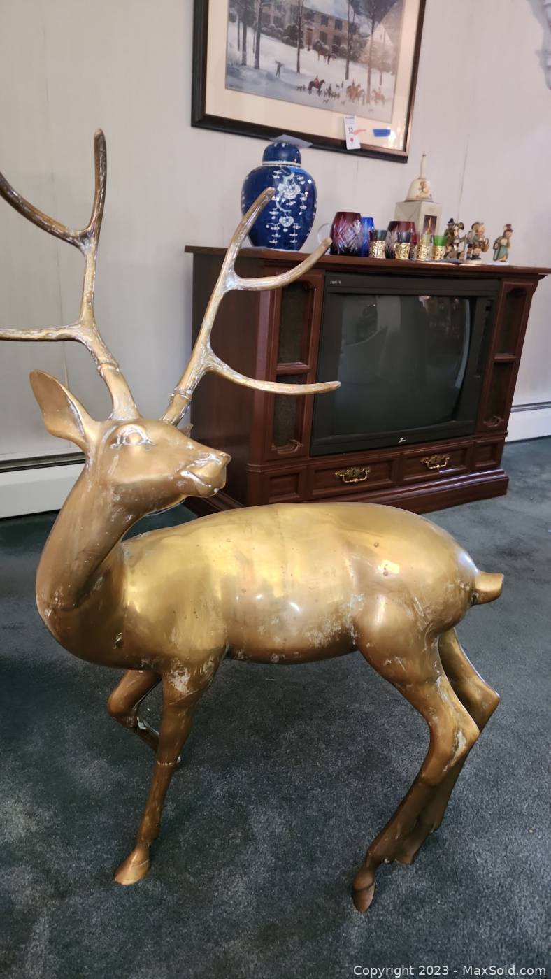 Large store brass deer