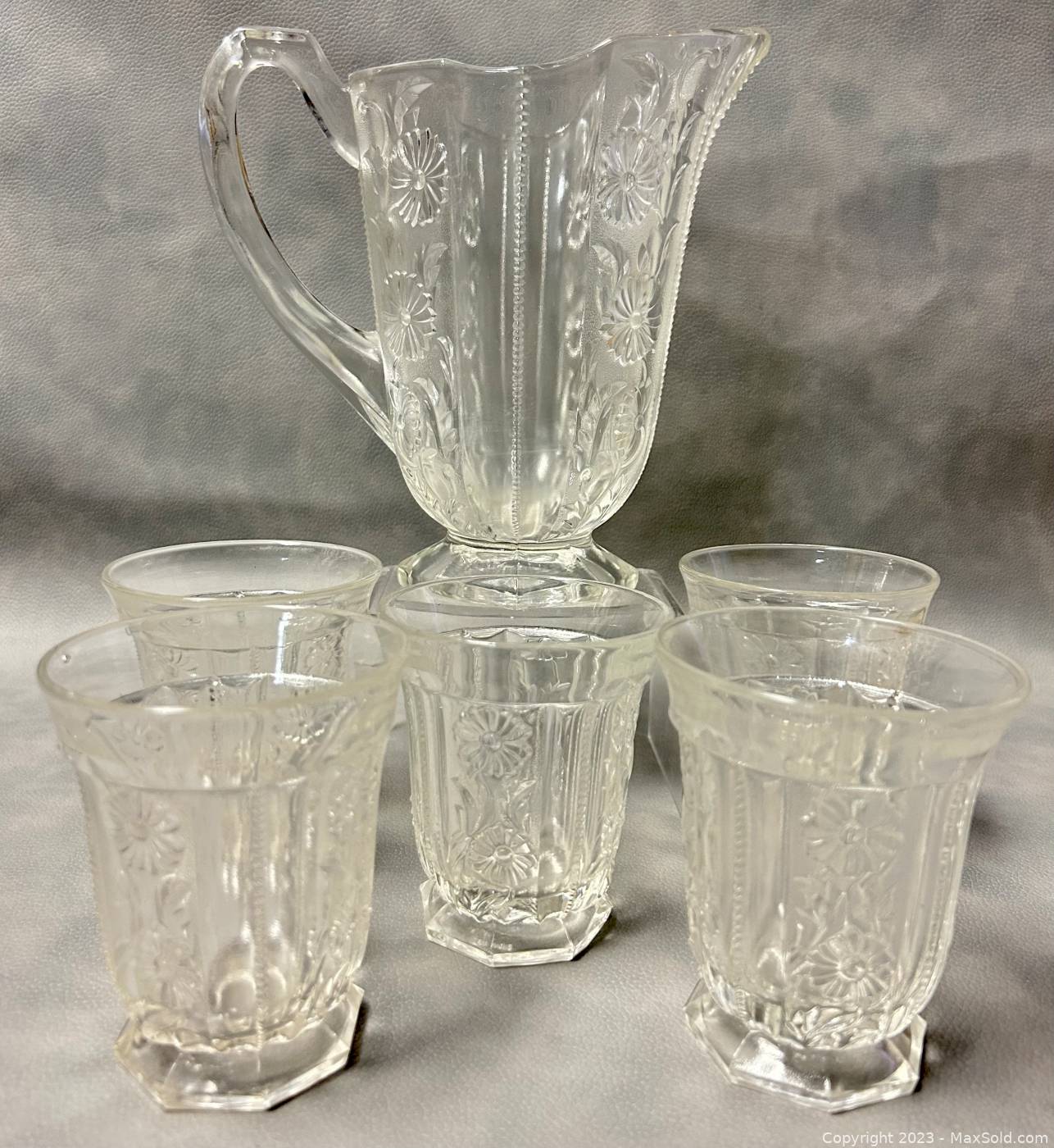 Sold at Auction: Glass Juice Pitcher With 5 Glasses