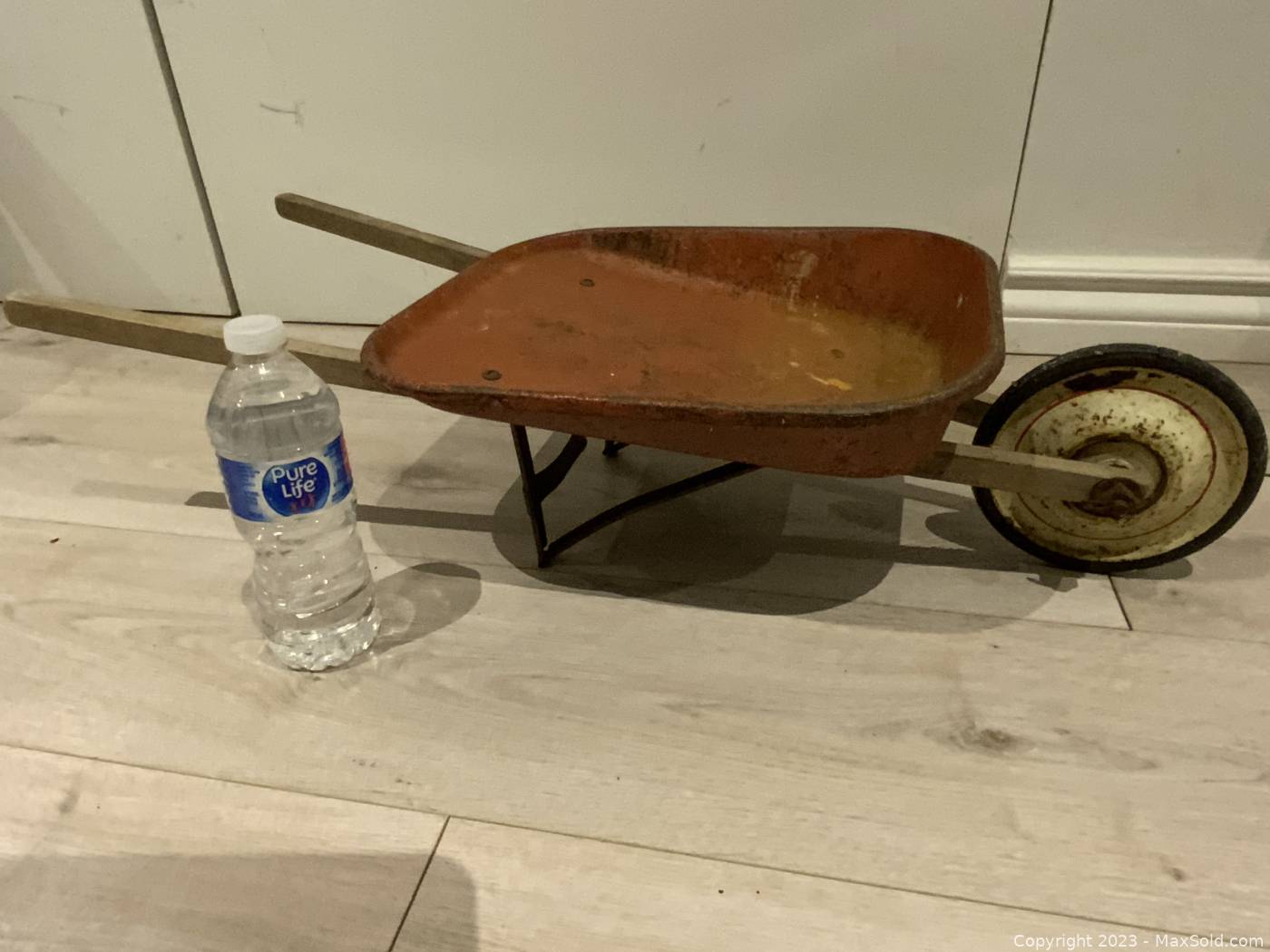 Vintage metal shop wheelbarrow for sale