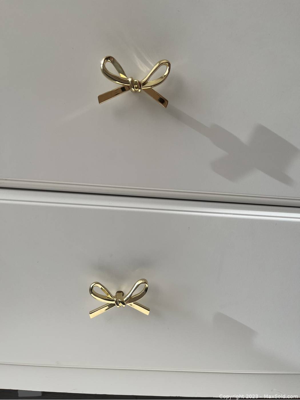 Pottery Barn Kids White Dresser with Gold Bow Knobs | Maxsold