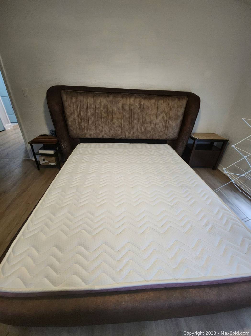 Used Queen Mattress and Bed Frame with Animal Damage Maxsold