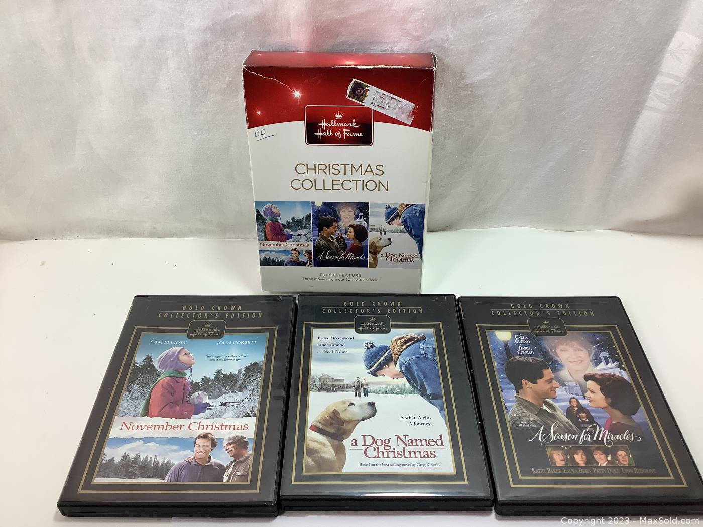 https://d12srav5gxm0re.cloudfront.net/auctionimages/88196/1702235494/wspecial_edition_hallmark_hall_of_fame_movies_christmas_collection_1_dvd_set_of_3_a_dog_named_christmas_november_christmas_and_a_season_for_miracles-56-1.jpeg