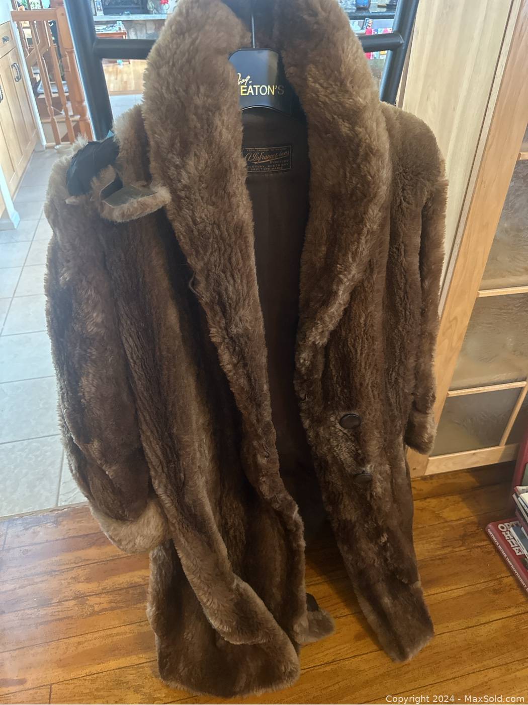 Knee length fur clearance coat