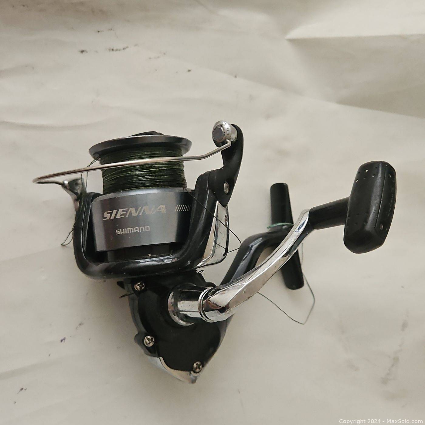 https://d12srav5gxm0re.cloudfront.net/auctionimages/90053/1712419530/wshimano_4000fe_spinning_fishing_reel-4-1.jpg
