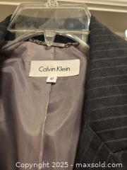 MaxSold Auction: Calvin Klein Women&#39;s Pinstripe 2-Piece Suit, Size 12, Charcoal/Black - Coppell (Texas, USA) SELLER MANAGED Downsizing Online Auction - Parker Drive