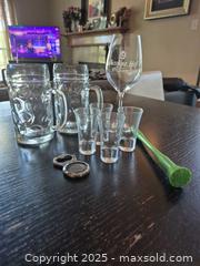 MaxSold Auction: Mixed Barware Set: Shot Glasses, Beer Steins, Wine Glass, Tools - Coppell (Texas, USA) SELLER MANAGED Downsizing Online Auction - Parker Drive