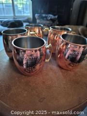 MaxSold Auction: Set of 5 Copper-Plated Moscow Mule Mugs with Gold-Tone Handles - Coppell (Texas, USA) SELLER MANAGED Downsizing Online Auction - Parker Drive
