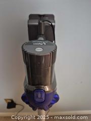MaxSold Auction: Dyson Cordless Stick Vacuum (Bagless) with Accessories - Kingston (Ontario, Canada) SELLER MANAGED Downsizing Online Auction - Canniff Place