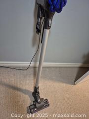 MaxSold Auction: Dyson Cordless Stick Vacuum (Bagless) with Accessories - Kingston (Ontario, Canada) SELLER MANAGED Downsizing Online Auction - Canniff Place