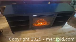 MaxSold Auction: Electric Fireplace TV Stand / Media Console, Black - Kingston (Ontario, Canada) SELLER MANAGED Downsizing Online Auction - Canniff Place