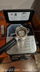 MaxSold Auction:  Espresso / capuccino Machine by Delonghi with Accessories - Kingston (Ontario, Canada) SELLER MANAGED Downsizing Online Auction - Canniff Place