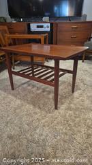 MaxSold Auction: Mid-Century Modern Rectangular Teak-Tone Coffee Table, 30x20x20 - Kingston (Ontario, Canada) SELLER MANAGED Downsizing Online Auction - Canniff Place