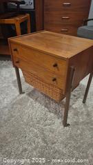 MaxSold Auction: Mid-Century Modern Teak Veneer  Sewing Table with Basket - Kingston (Ontario, Canada) SELLER MANAGED Downsizing Online Auction - Canniff Place