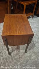 MaxSold Auction: Mid-Century Modern Teak Veneer  Sewing Table with Basket - Kingston (Ontario, Canada) SELLER MANAGED Downsizing Online Auction - Canniff Place
