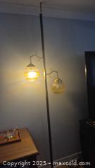MaxSold Auction: Mid-Century Modern tension pole Two-Light Floor Lamp with Amber Globe Shades - Kingston (Ontario, Canada) SELLER MANAGED Downsizing Online Auction - Canniff Place