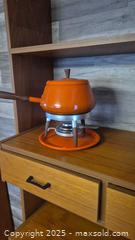 MaxSold Auction: Orange Mid-Century Fondue Pot Set with Stand and Burner - Kingston (Ontario, Canada) SELLER MANAGED Downsizing Online Auction - Canniff Place
