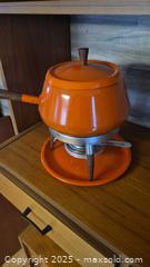 MaxSold Auction: Orange Mid-Century Fondue Pot Set with Stand and Burner - Kingston (Ontario, Canada) SELLER MANAGED Downsizing Online Auction - Canniff Place