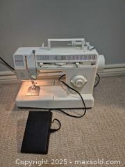 MaxSold Auction: Singer Electric Sewing Machine Model  5050 /9818C, 120V 60Hz - Kingston (Ontario, Canada) SELLER MANAGED Downsizing Online Auction - Canniff Place