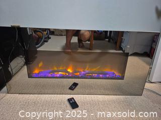 MaxSold Auction: Wall-Mount Electric  heating Fireplace, Linear Glass Front, 36 in,  multi color option  - Kingston (Ontario, Canada) SELLER MANAGED Downsizing Online Auction - Canniff Place